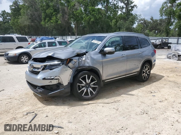 2021 Honda Pilot Touring 8-Passenger with VIN 5FNYF6H90MB079698, listed as a Copart auction lot 52011005 with 90,331 mi miles and Non repairable. Bid and sale history available at DreamBid. Image 1.