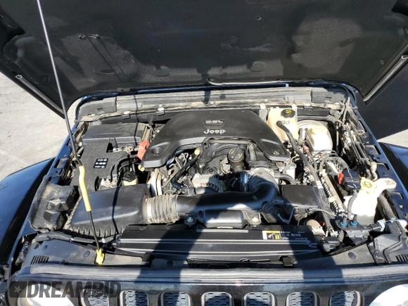2018 Jeep Wrangler Unlimited Rubicon with VIN 1C4HJXFGXJW255881, listed as a Copart auction lot 62958975 with 39,439 mi miles and Salvage title. Bid and sale history available at DreamBid. Image 12.