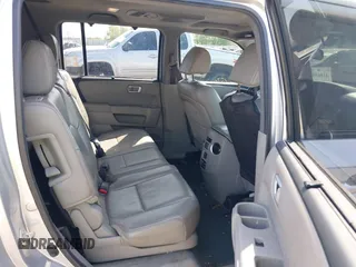 2013 Honda Pilot Touring with VIN 5FNYF3H95DB032438, listed as a IAAI auction lot 41865938 with 298,973 mi miles and . Bid and sale history available at DreamBid. Image 8.