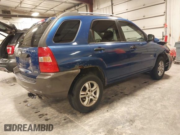 2006 Kia Sportage LX z VIN KNDJE723467245423, wystawiony jako IAAI lot #41388807 z przebiegiem 135 484 mil mil oraz . Historia ofert i sprzedaży dostępna na DreamBid. Obrazek 4.