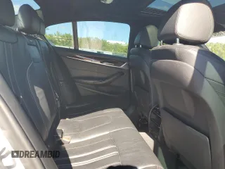 2018 BMW 5 Series 530e with VIN WBAJA9C52JG623073, listed as a Copart auction lot 82718984 with 79,543 mi miles and Clean title. Bid and sale history available at DreamBid. Image 10.