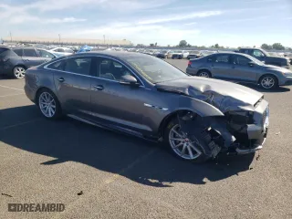 2017 Jaguar XJ with VIN SAJWA1C73H8W11256, listed as a Copart auction lot 49153633 with 12,199 mi miles. Bid and sale history available at carsss.com. Image 4.