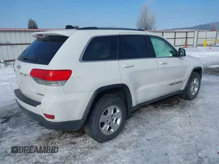 2017 Jeep Grand Cherokee Laredo with VIN 1C4RJFAG3HC688623, listed as a IAAI auction lot 41561414 with 75,407 mi miles. Bid and sale history available at carsss.com. Image 4.