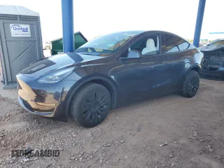 2024 Tesla Model Y Long Range with VIN 7SAYGDEE9RA235022, listed as a Copart auction lot 57358255 with 8,610 mi miles and Salvage title. Bid and sale history available at DreamBid. Image 1.