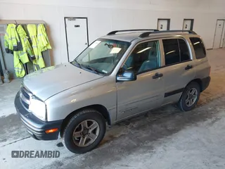 2003 Chevrolet Tracker z VIN 2CNBE13C336953203, wystawiony jako IAAI lot #42195810 z przebiegiem 123 503 mil mil oraz . Historia ofert i sprzedaży dostępna na DreamBid. Obrazek 2.