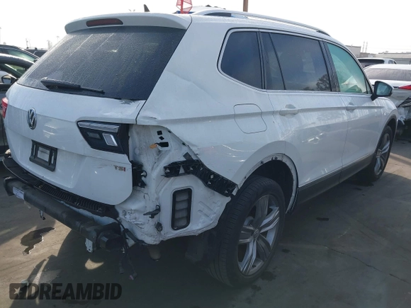 2018 Volkswagen Tiguan SEL Premium with VIN 3VV5B7AX5JM176434, listed as a IAAI auction lot 41684514 with 47,988 mi miles and . Bid and sale history available at DreamBid. Image 4.