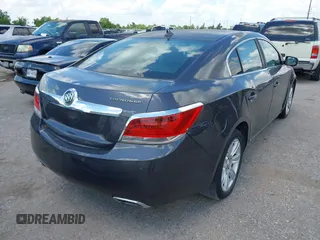 2013 Buick LaCrosse Leather z VIN 1G4GC5E37DF159523, wystawiony jako IAAI lot #42564794 z przebiegiem 236 083 mil mil oraz . Historia ofert i sprzedaży dostępna na DreamBid. Obrazek 4.
