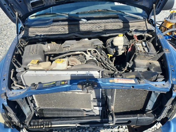 2005 Dodge 1500 SLT z VIN 1D7HU18D95J591540, wystawiony jako Copart lot #58260035 z przebiegiem 232 384 mil mil oraz Szkoda całkowita • Salvage title. Historia ofert i sprzedaży dostępna na DreamBid. Obrazek 11.