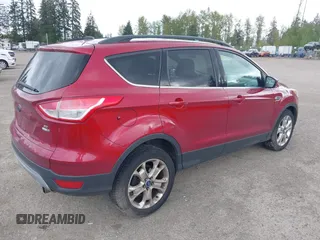 2013 Ford Escape SE with VIN 1FMCU9GXXDUB73916, listed as a IAAI auction lot 42086263 with 176,226 mi miles and . Bid and sale history available at DreamBid. Image 4.