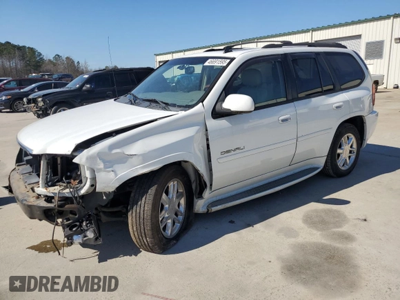 2006 GMC Envoy Denali with VIN 1GKET63M762190296, listed as a Copart auction lot 46691595 with 128,985 mi miles and Salvage Title. Bid and sale history available at carsss.com. Image 1.