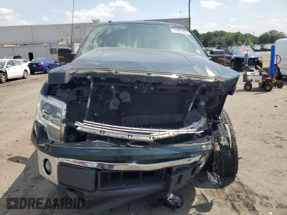 2014 Ford F-150 XL with VIN 1FTFW1ET3EKG39910, listed as a Copart auction lot 61995165 with 139,067 mi miles and Salvage title. Bid and sale history available at DreamBid. Image 5.