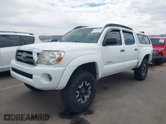 2009 Toyota Tacoma PreRunner with VIN 3TMJU62N49M076433, listed as a IAAI auction lot 41902369 with 164,827 mi miles. Bid and sale history available at carsss.com. Image 2.