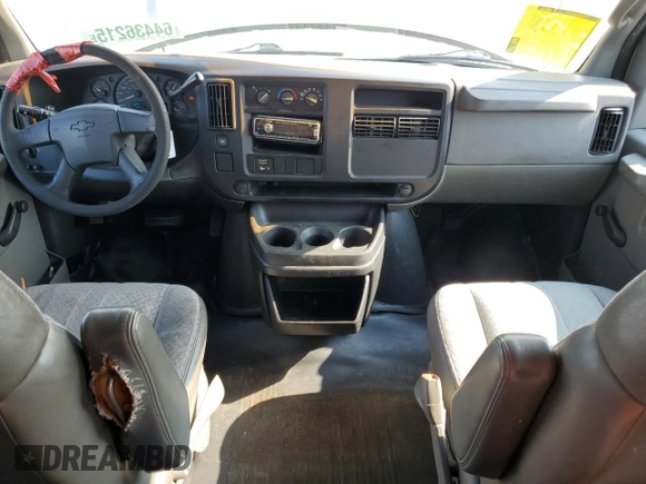 2004 Chevrolet Express Passenger with VIN 1GAHG39U741128458, listed as a Copart auction lot 64436215 with 118,387 mi miles and Salvage title. Bid and sale history available at DreamBid. Image 8.