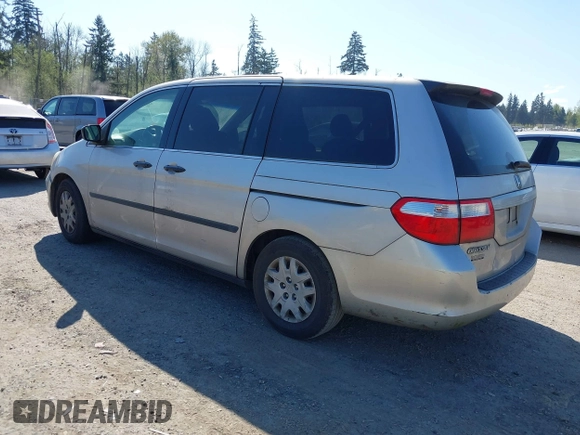 2006 Honda Odyssey LX with VIN 5FNRL38236B127129, listed as a IAAI auction lot 42041994 with 282,313 mi miles. Bid and sale history available at carsss.com. Image 3.