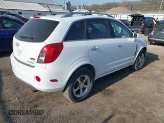 2014 Chevrolet Captiva Sport LT z VIN 3GNAL3EK8ES557432, wystawiony jako IAAI lot #42018256 z przebiegiem 92 569 mil mil oraz . Historia ofert i sprzedaży dostępna na DreamBid. Obrazek 4.