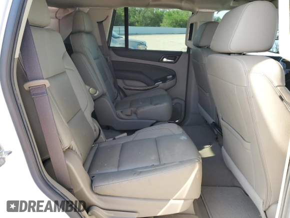2020 Chevrolet Tahoe LT z VIN 1GNSKBKC7LR124845, wystawiony jako Copart lot #53354715 z przebiegiem Nie podano mil oraz Szkoda całkowita • Salvage title. Historia ofert i sprzedaży dostępna na DreamBid. Obrazek 11.