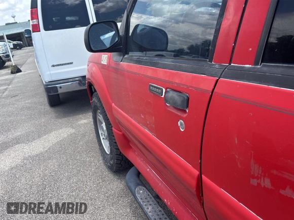 2004 Ford Explorer Sport Trac XLS z VIN 1FMZU67KX4UC40253, wystawiony jako IAAI lot #42894779 z przebiegiem 165 814 mil mil oraz . Historia ofert i sprzedaży dostępna na DreamBid. Obrazek 11.