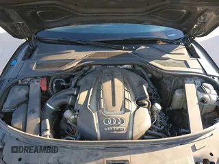 2013 Audi A8 L 4.0L with VIN WAUR2AFD3DN012893, listed as a IAAI auction lot 41209419 with 116,990 mi miles. Bid and sale history available at carsss.com. Image 10.