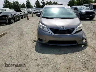 2014 Toyota Sienna LE AAS with VIN 5TDKK3DC6ES491574, listed as a Copart auction lot 59815785 with 189,975 mi miles and Salvage title. Bid and sale history available at DreamBid. Image 14.