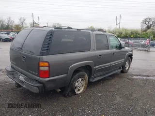 2002 Chevrolet Suburban LT with VIN 1GNFK16T92J210497, listed as a IAAI auction lot 41964048 with 208,752 mi miles. Bid and sale history available at carsss.com. Image 6.