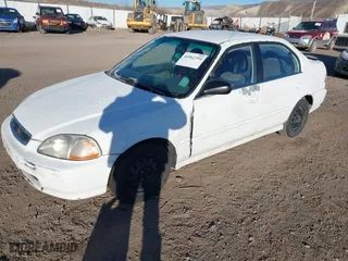 1998 Honda Civic LX with VIN 2HGEJ6675WH553663, listed as a IAAI auction lot 41062394 with 117,514 mi miles. Bid and sale history available at carsss.com. Image 2.