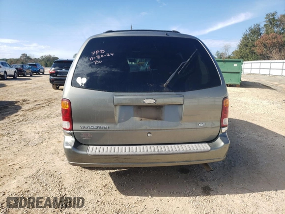 2002 Ford Windstar SE with VIN 2FMZA52462BA09199, listed as a Copart auction lot 83097064 with 216,158 mi miles and Salvage title. Bid and sale history available at DreamBid. Image 6.