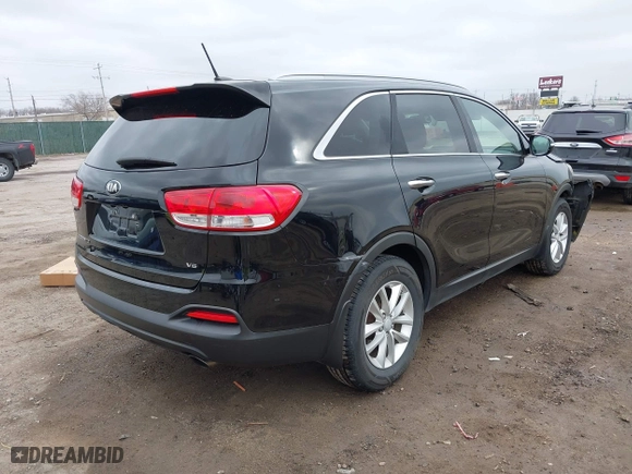 2016 Kia Sorento LX with VIN 5XYPG4A50GG129744, listed as a IAAI auction lot 41711949 with 127,954 mi miles. Bid and sale history available at carsss.com. Image 4.