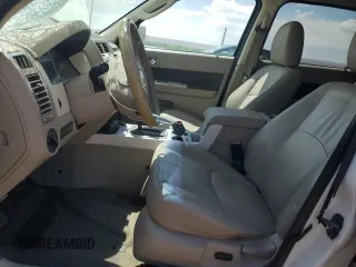2009 Mercury Mariner Hybrid with VIN 4M2CU39359KJ16466, listed as a Copart auction lot 57279615 with 351,095 mi miles and Salvage title. Bid and sale history available at DreamBid. Image 7.