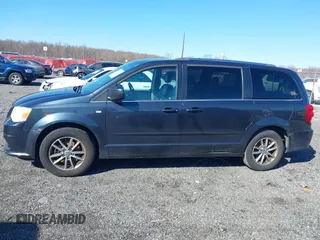 2014 Dodge Grand Caravan SXT with VIN 2C4RDGCG3ER339491, listed as a IAAI auction lot 41744826 with 146,757 mi miles and . Bid and sale history available at DreamBid. Image 14.