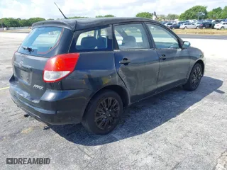 2003 Toyota Matrix Std with VIN 2T1KR32E63C116953, listed as a IAAI auction lot 41929877 with 299,999 mi miles. Bid and sale history available at carsss.com. Image 4.