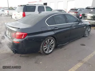 2016 BMW 5 Series 535i xDrive with VIN WBA5B3C55GG258022, listed as a IAAI auction lot 40850438 with 99,291 mi miles. Bid and sale history available at carsss.com. Image 4.