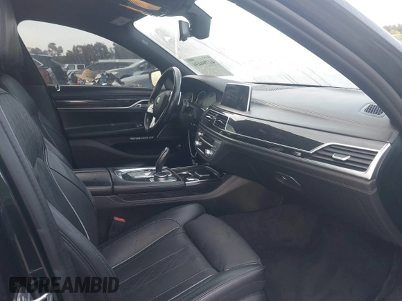 2016 BMW 7 Series 740i with VIN WBA7E2C51GG547537, listed as a IAAI auction lot 41794434 with 149,655 mi miles. Bid and sale history available at carsss.com. Image 5.