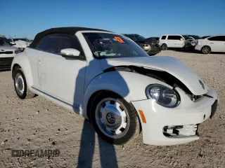 2015 Volkswagen Beetle 1.8T with VIN 3VW517AT7FM809440, listed as a Copart auction lot 84334724 with Not provided miles and Salvage title. Bid and sale history available at DreamBid. Image 4.