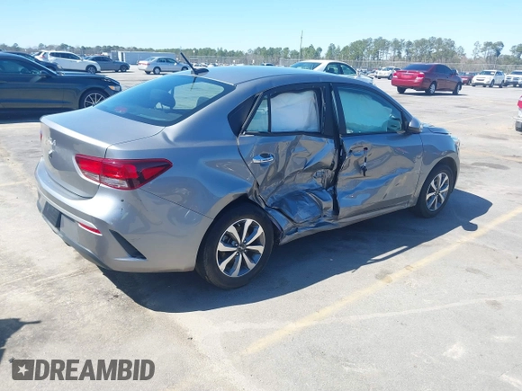 2022 Kia Rio S with VIN 3KPA24AD5NE481448, listed as a IAAI auction lot 41748379 with 65,123 mi miles. Bid and sale history available at carsss.com. Image 4.