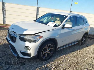 2018 BMW X1 sDrive28i with VIN WBXHU7C36J5H41267, listed as a IAAI auction lot 41270207 with 84,726 mi miles. Bid and sale history available at carsss.com. Image 17.