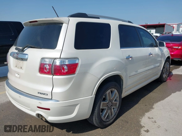2011 GMC Acadia Denali with VIN 1GKKVTED6BJ232742, listed as a IAAI auction lot 42047901 with 141,694 mi miles. Bid and sale history available at carsss.com. Image 4.