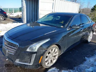2017 Cadillac CTS Luxury AWD z VIN 1G6AX5SX7H0176310, wystawiony jako IAAI lot #41293373 z przebiegiem 161 264 mil mil oraz . Historia ofert i sprzedaży dostępna na DreamBid. Obrazek 18.