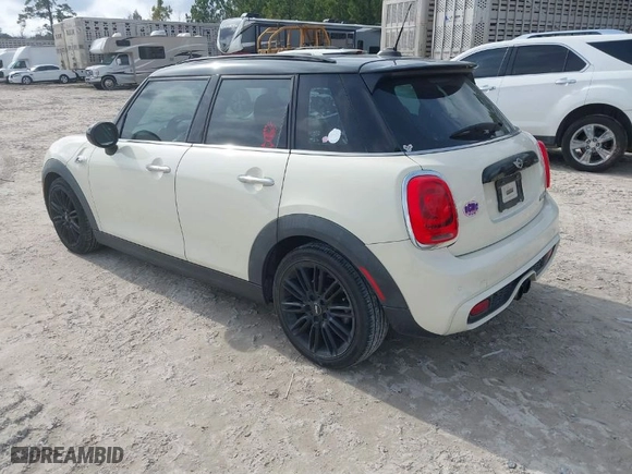 2017 MINI Hardtop 4 Door Cooper S with VIN WMWXU3C54H2D32602, listed as a IAAI auction lot 41458333 with 124235 miles. Bid and sale history available at carsss.com. Image 3.