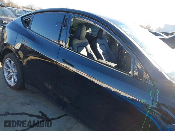 2024 Tesla Model Y Long Range with VIN 7SAYGDEE6RA276983, listed as a IAAI auction lot 41614141 with 4,472 mi miles and . Bid and sale history available at DreamBid. Image 14.