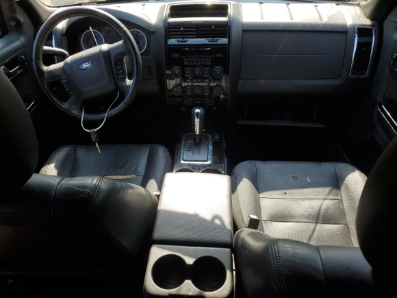 2010 Ford Escape Limited with VIN 1FMCU9EG0AKA79585, listed as a Copart auction lot 61580715 with Not provided miles and Salvage title. Bid and sale history available at DreamBid. Image 8.