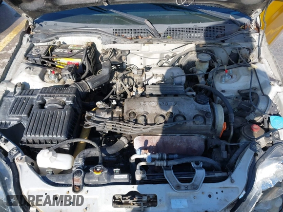 1997 Honda Civic EX z VIN 2HGEJ8646VH587451, wystawiony jako IAAI lot #42102826 z przebiegiem 13 144 mil mil oraz . Historia ofert i sprzedaży dostępna na DreamBid. Obrazek 10.