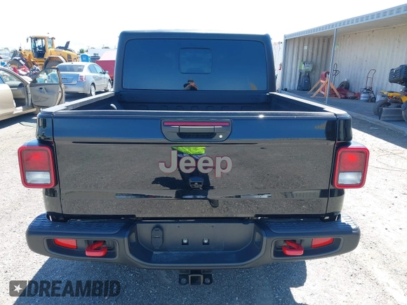 2023 Jeep Gladiator Rubicon z VIN 1C6JJTBG3PL531982, wystawiony jako IAAI lot #42211139 z przebiegiem 28 301 mil mil oraz . Historia ofert i sprzedaży dostępna na DreamBid. Obrazek 16.