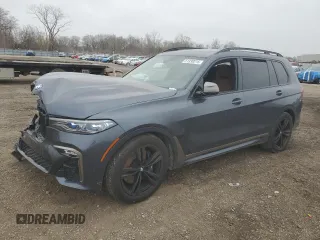 2022 BMW X7 M50i z VIN 5UXCX6C05N9J39176, wystawiony jako Copart lot #51330215 z przebiegiem Nie podano mil oraz Szkoda całkowita • Salvage title. Historia ofert i sprzedaży dostępna na DreamBid. Obrazek 1.