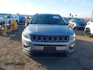 2019 Jeep Compass Altitude with VIN 3C4NJCBB0KT743606, listed as a IAAI auction lot 41468490 with 57,787 mi miles and . Bid and sale history available at DreamBid. Image 12.
