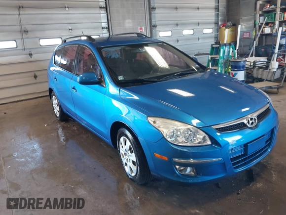 2010 Hyundai Elantra Touring SE with VIN KMHDC8AE8AU077884, listed as a IAAI auction lot 41833566 with 192,421 mi miles. Bid and sale history available at carsss.com. Image 1.