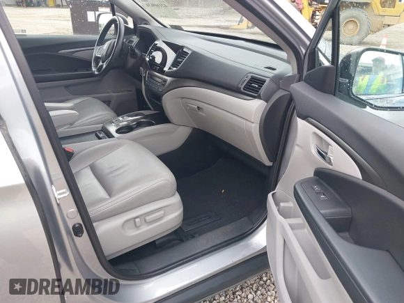2021 Honda Pilot EX-L with VIN 5FNYF6H50MB063465, listed as a IAAI auction lot 42160636 with 28,595 mi miles and . Bid and sale history available at DreamBid. Image 5.