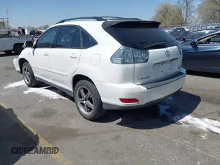 2004 Lexus RX 330 with VIN JTJGA31U840034009, listed as a IAAI auction lot 42004638 with 252,942 mi miles. Bid and sale history available at carsss.com. Image 3.