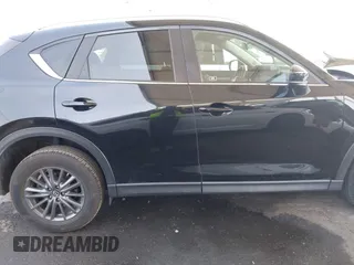 2020 Mazda CX-5 Touring with VIN JM3KFACM0L0804998, listed as a IAAI auction lot 41850998 with 44,519 mi miles. Bid and sale history available at carsss.com. Image 13.
