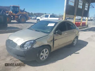 2007 Hyundai Accent GLS with VIN KMHCN46CX7U093034, listed as a IAAI auction lot 41855739 with 152,449 mi miles. Bid and sale history available at carsss.com. Image 2.