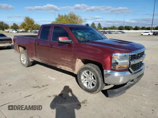 2016 Chevrolet Silverado 1500 LT with VIN 1GCVKREC9GZ148726, listed as a Copart auction lot 79487234 with 122,009 mi miles and Salvage Title. Bid and sale history available at DreamBid. Image 4.